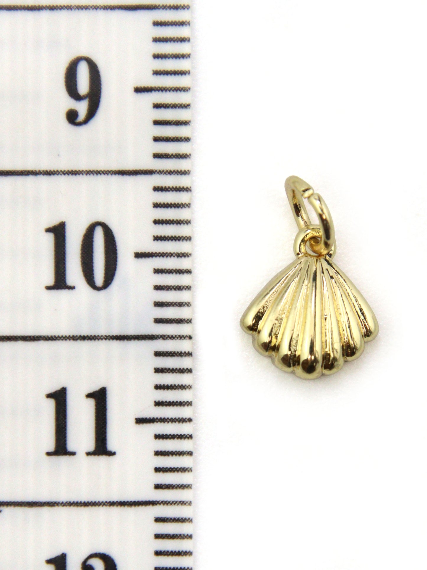 Charm petit coquillage 9 mm